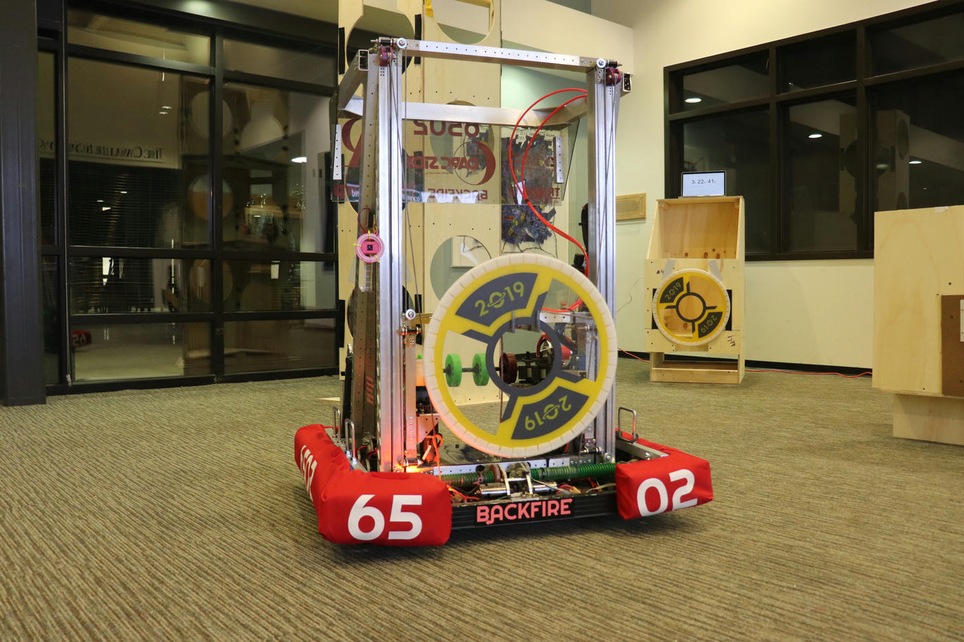 Backfire holding a hatch panel on stop build day, shortly before our first competition.